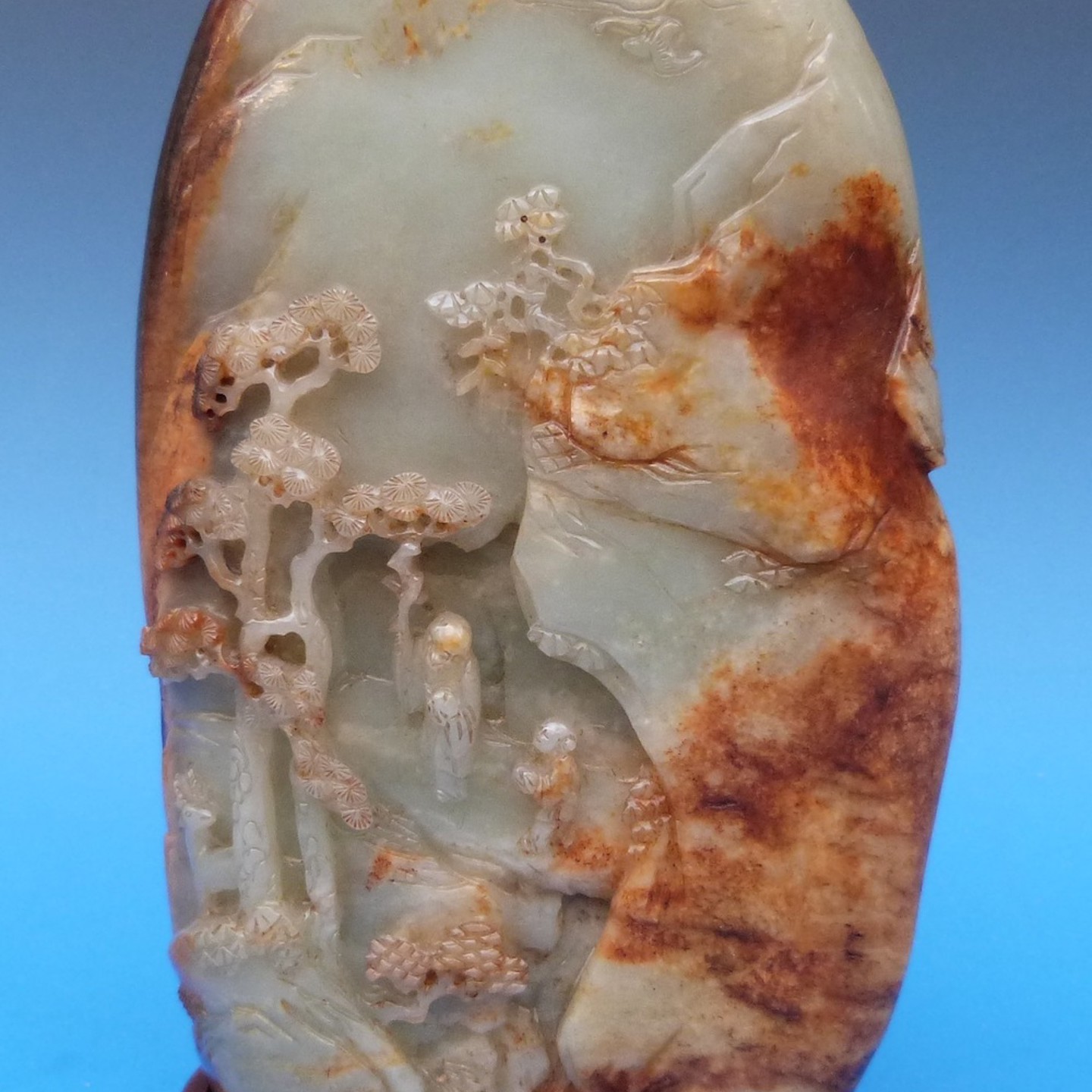 An 18Thc Chinese Jade Boulder Carved With Mountainous Landscape, Sage And Pine Trees, On Fitted Wooden Stand (21Cm Excluding Stand) Sold For £17,000