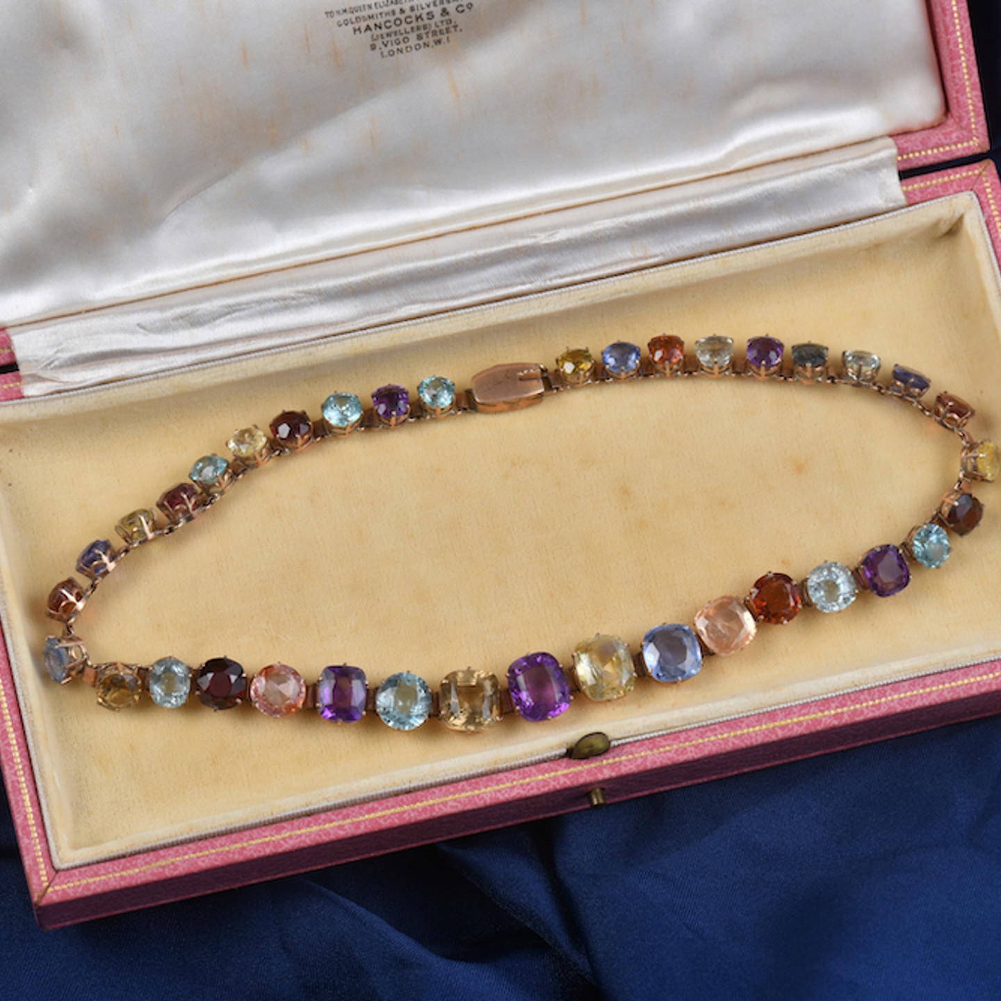 A C1900 Rose Gold Necklace Set With Twelve Natural Ceylon Sapphires, Garnet, Citrine, Amethyst, Zircons And Quartz. Sold For £9500