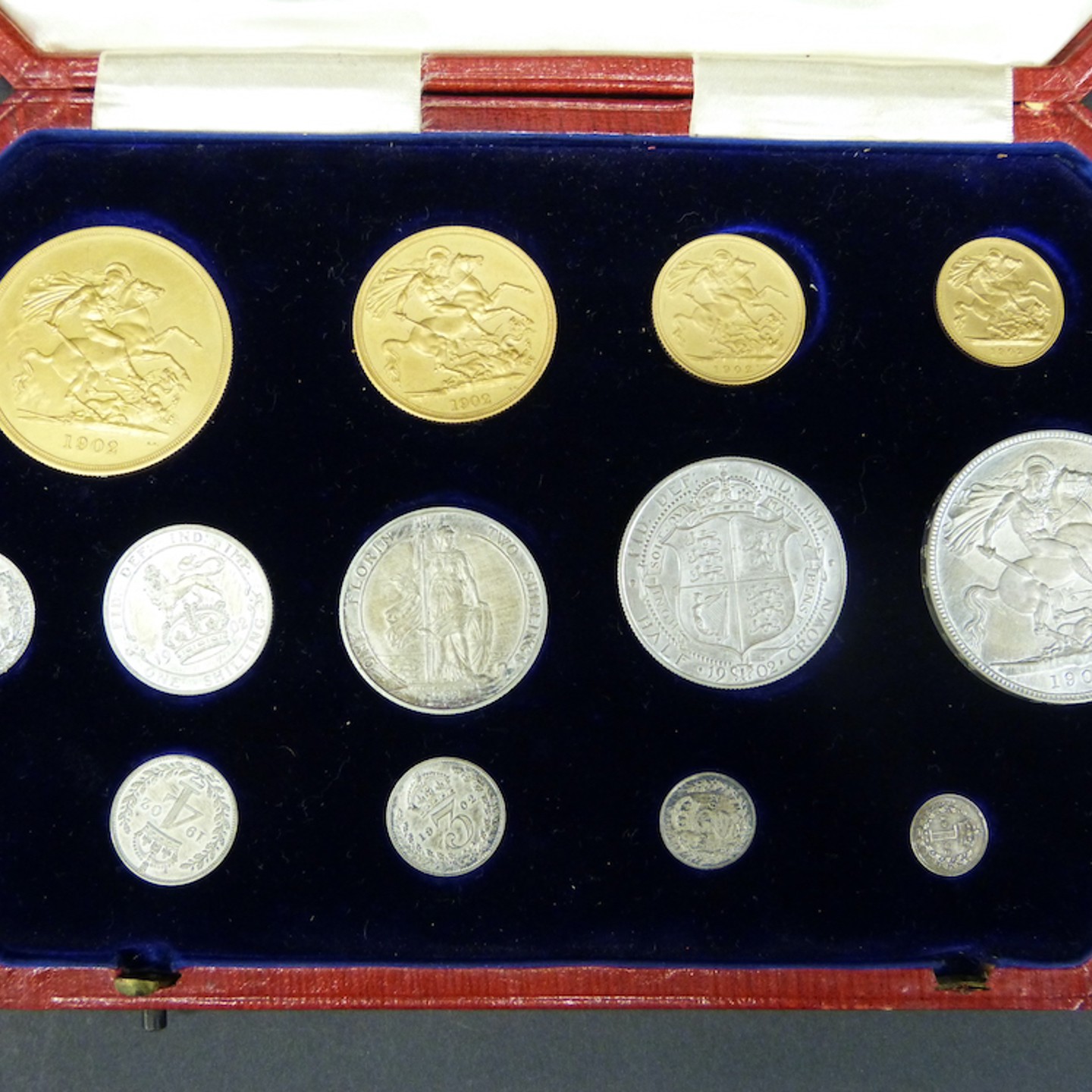 A Cased 1902 Specimen Coin Set, Including Gold Ś5 Coin, Double Sovereign, Half Sovereign, Silver Crown, Half Crown, Florin, Shilling, Six Pence And Maundy Set. Sold For Ś5,000
