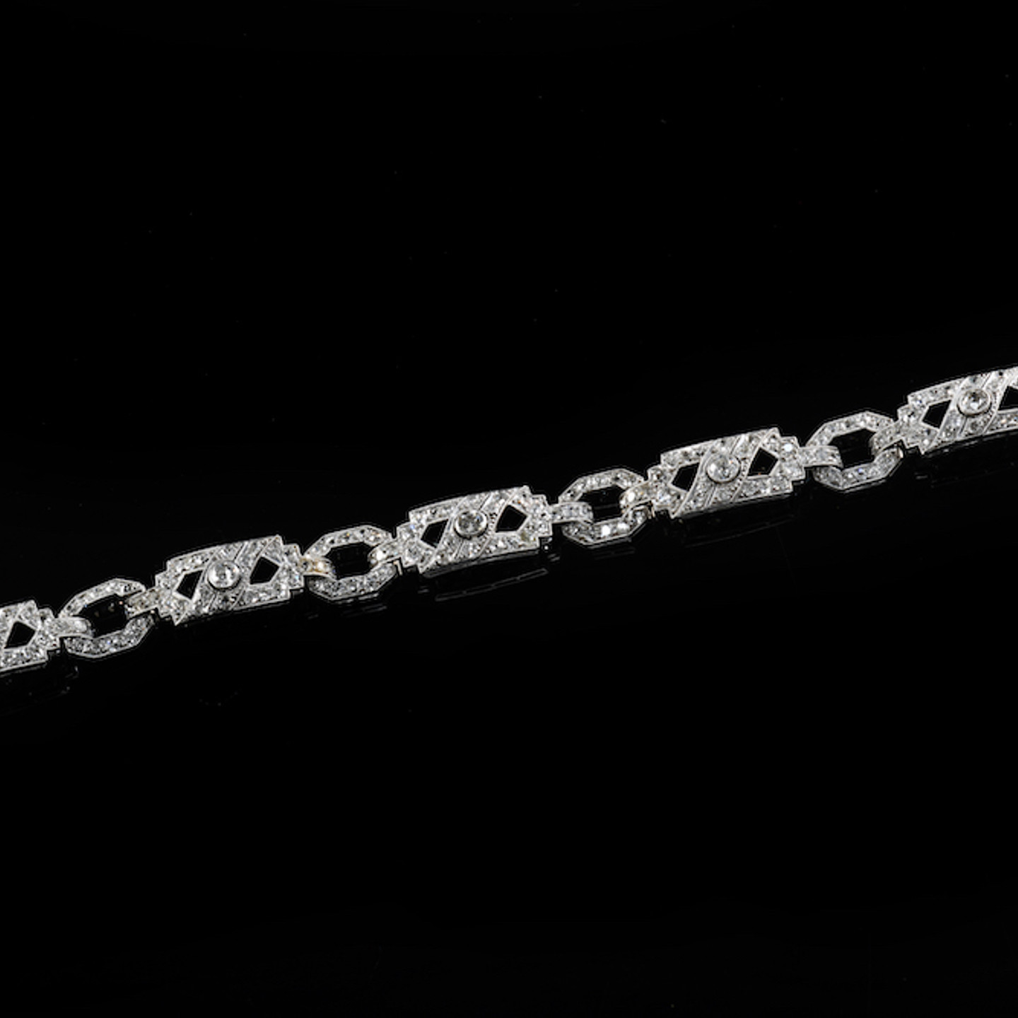 An Art Deco Platinum Bracelet Set With Diamonds. Sold For £3,500