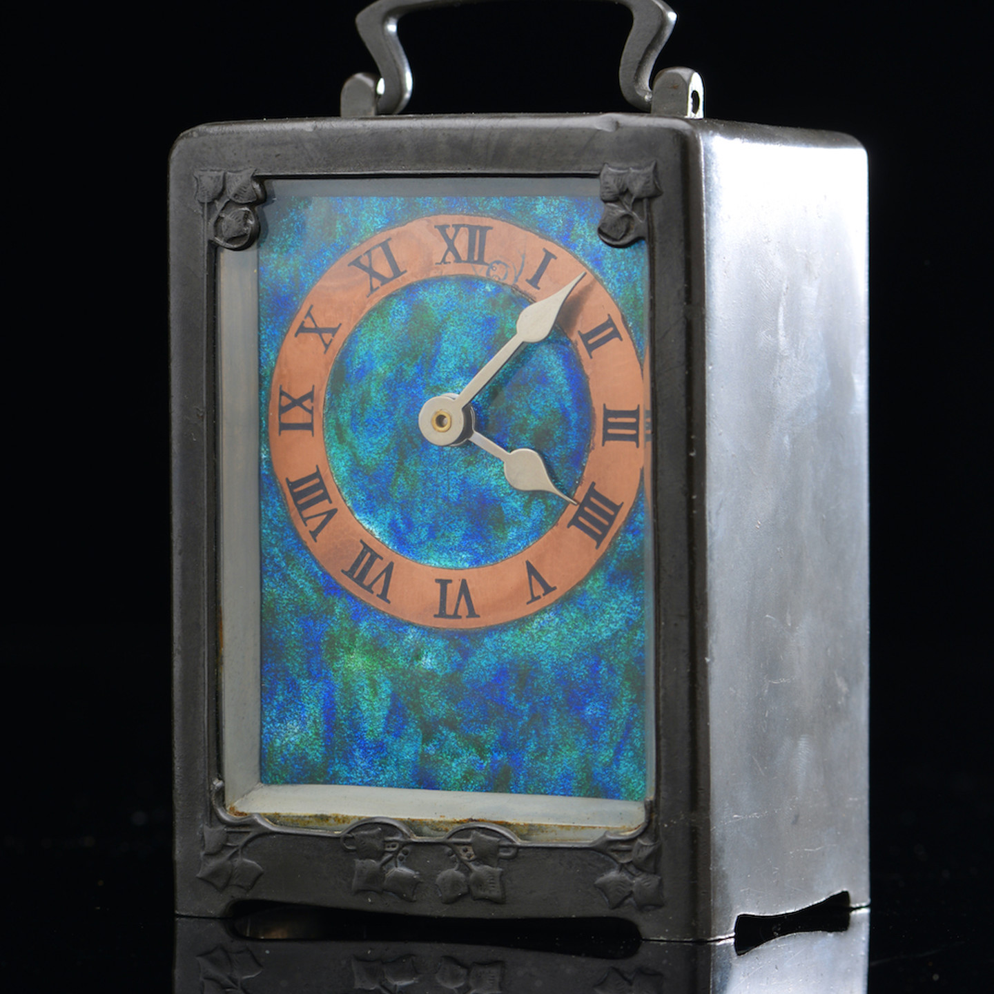 An Archibald Knox Liberty Clock With Arts And Crafts Pewter Case . Sold For £1200