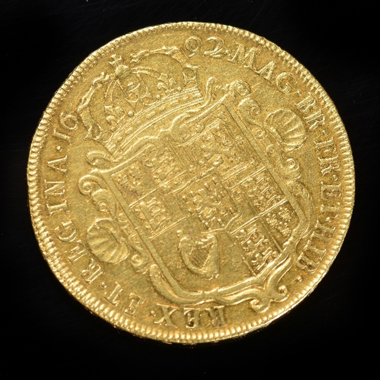 A 1692 William And Mary Gold Five Guinea Piece, Near VF. Sold For Ś8,400