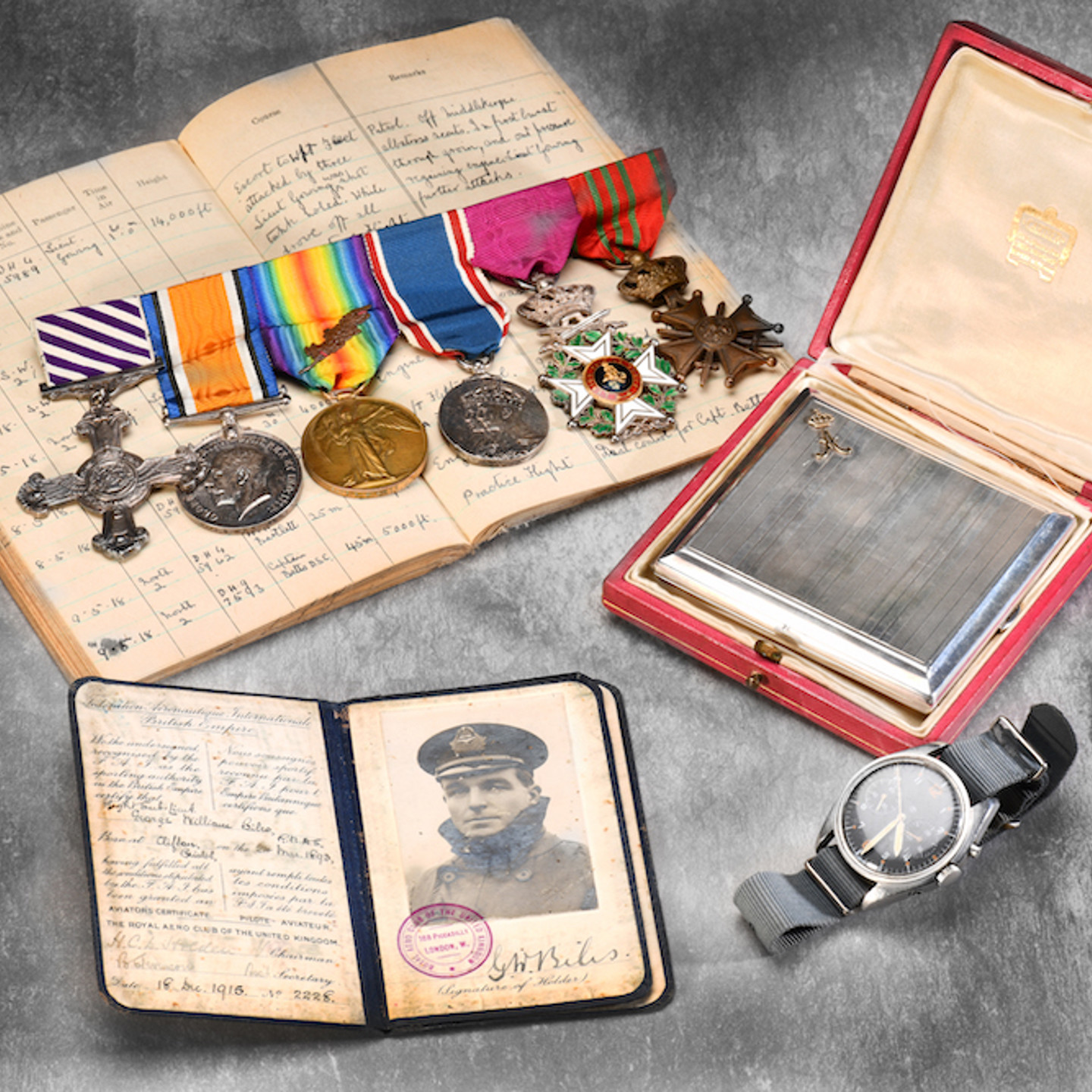 Royal Air Force Royal Flying Corps WWI Distinguished Flying Cross (DFC) Medal Group With Associated Documentation, Log Books, Ephemera And Personal Effect Sold 18,500