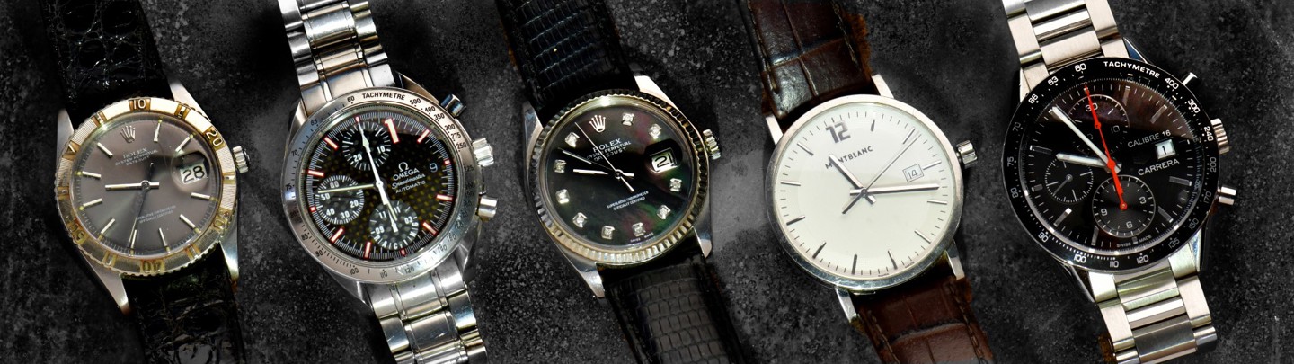Close up of various branded wrist watches